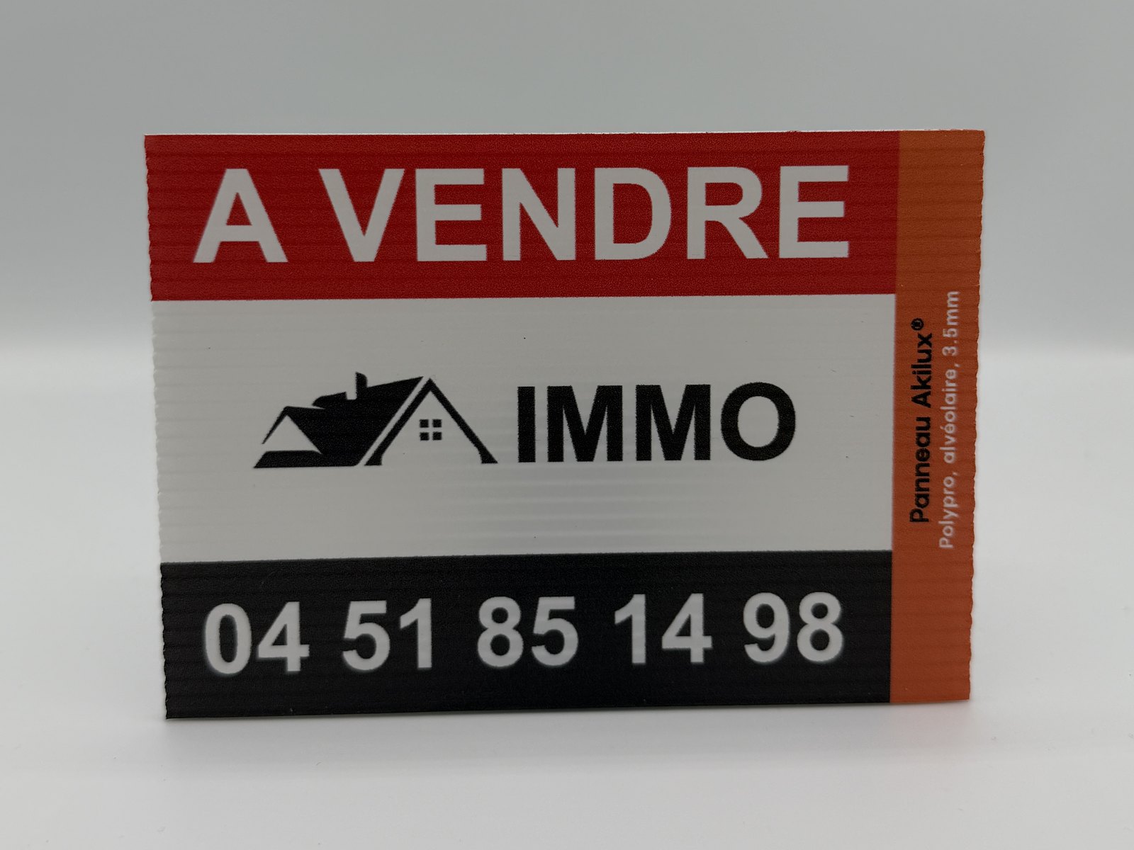 Panneau immobilier Akilux — À vendre
